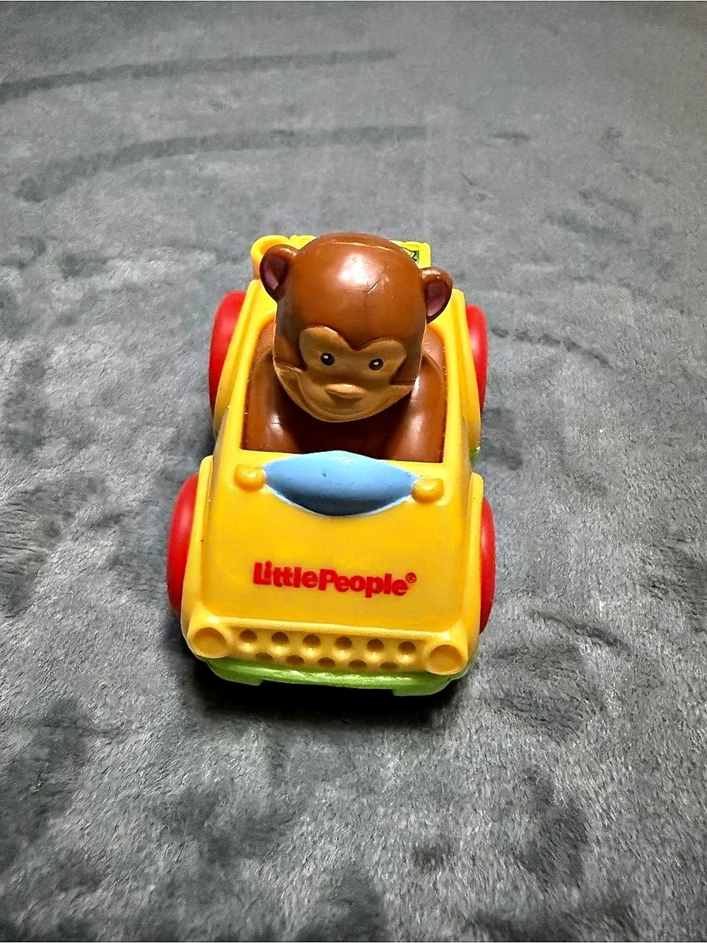 2012 Fisher-Price Mattel yellow Little People Monkey In Toy Car